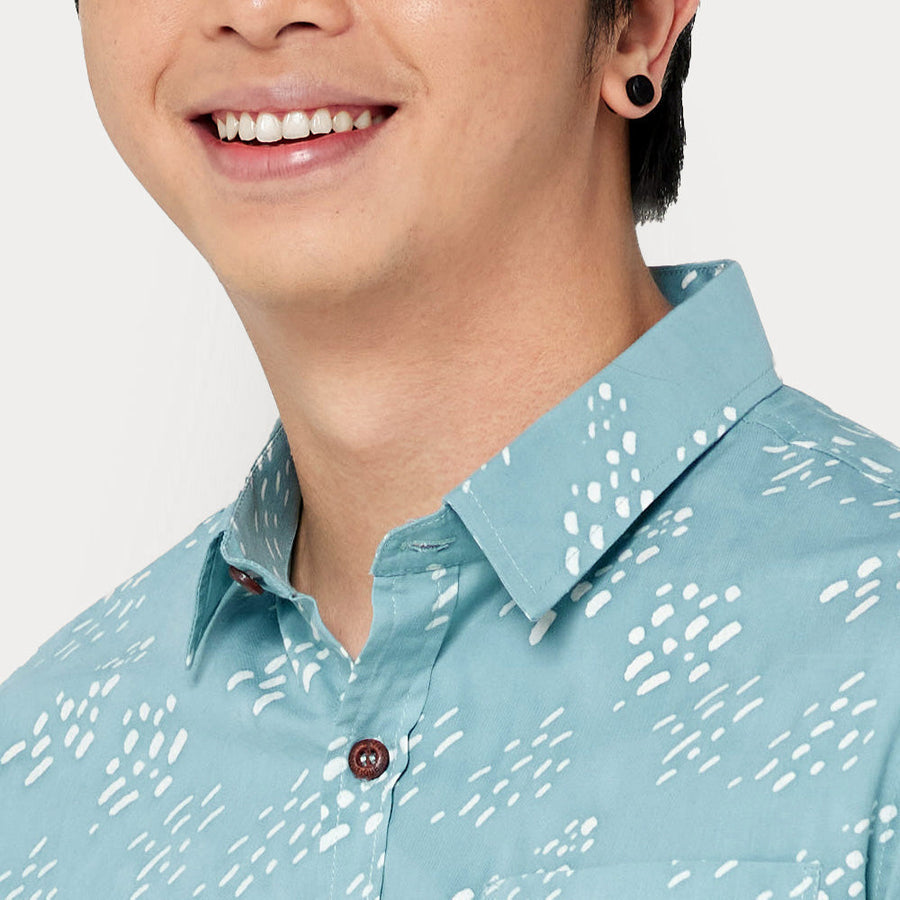 A close up photo of batik shirts called arctic seeds