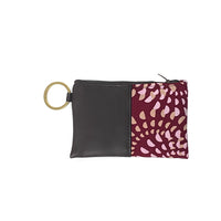 a photo of a card holder wallet in the pattern crimson lunar against a neutral background