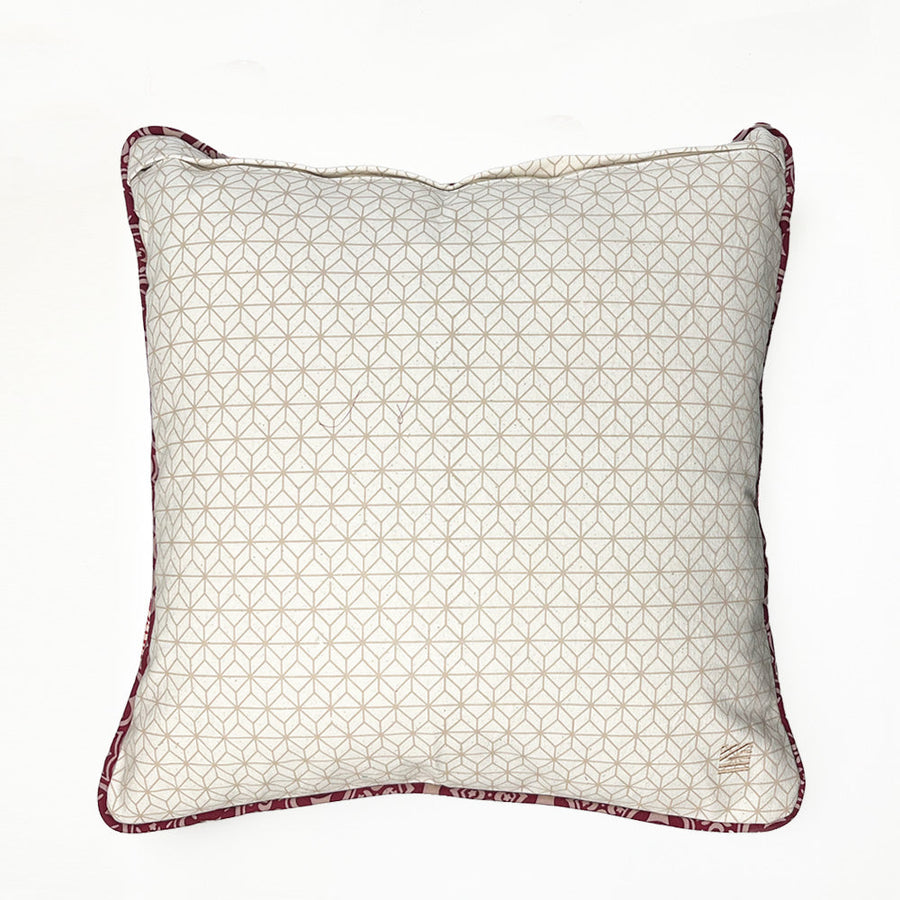 A whitebox photo of pillow cover in crimson celestial showing back side of it