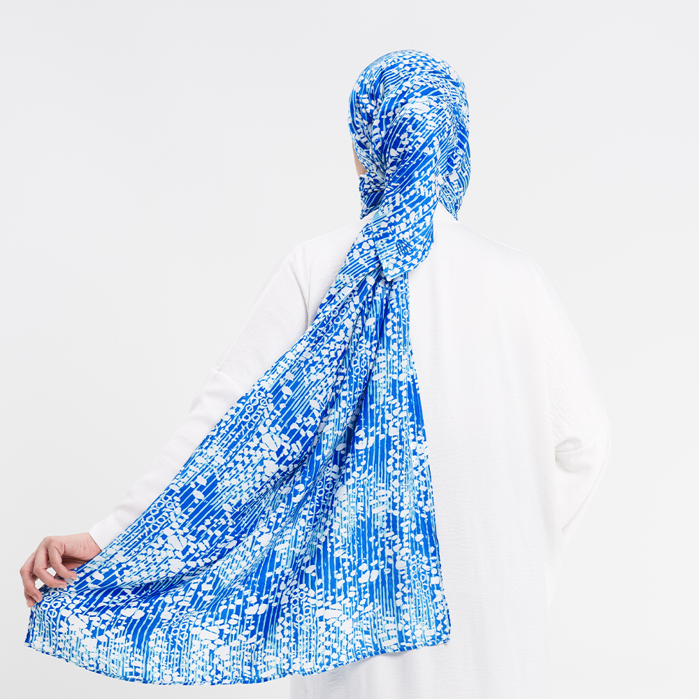 a back photo of a batik scarf to showcase the details on the back batik scarf blue bintik