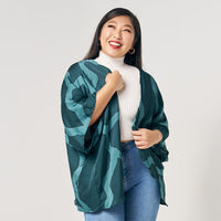 A women model is posing in kimono cardigan. In pattern forest chain