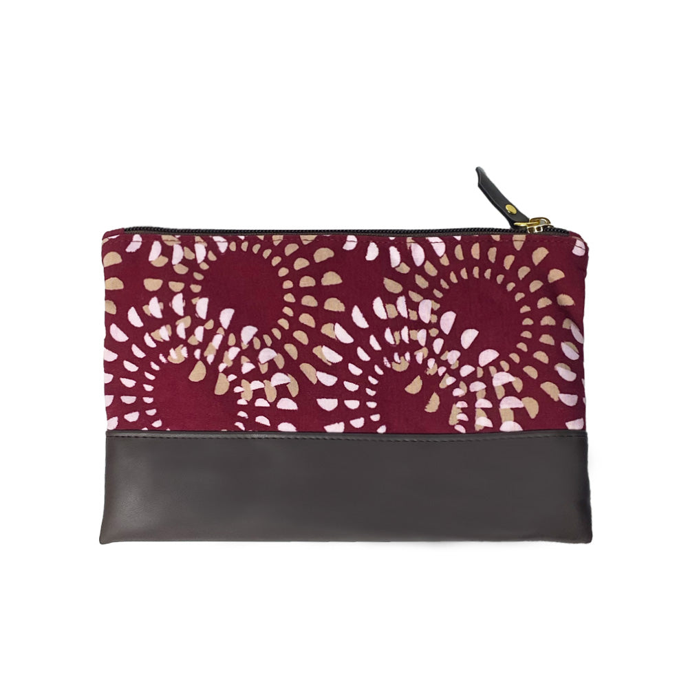 A picture of a handcrafted batik zip pouch showing back side of the zip pouch