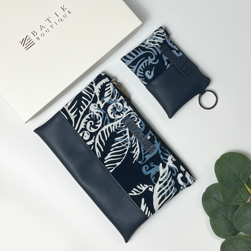 organizer set against a neutral background with blue nautical fern with a gifting box
