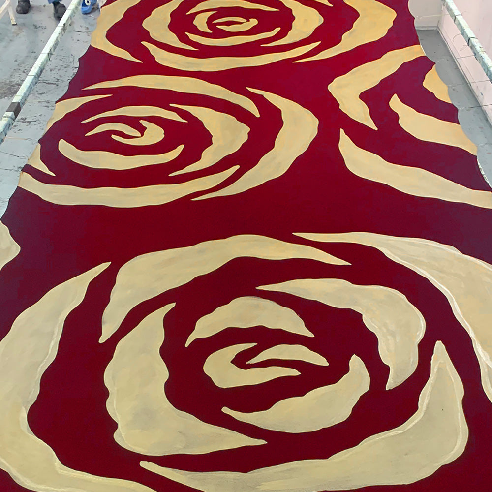 authentic batik laid out for display with the pattern crimson rose