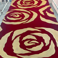 A photo of fabric in crimson rose print