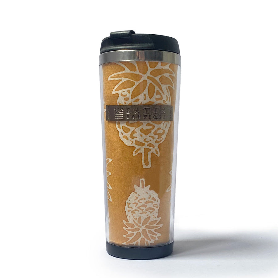 a front view of a golden pineapple tumbler made of batik