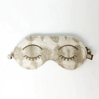 A whitebox photo of batik eye mask in shibori mangosteen