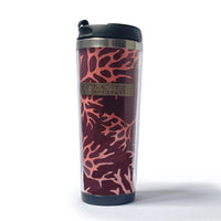a maroon coral tumbler made of batik against a neutral background