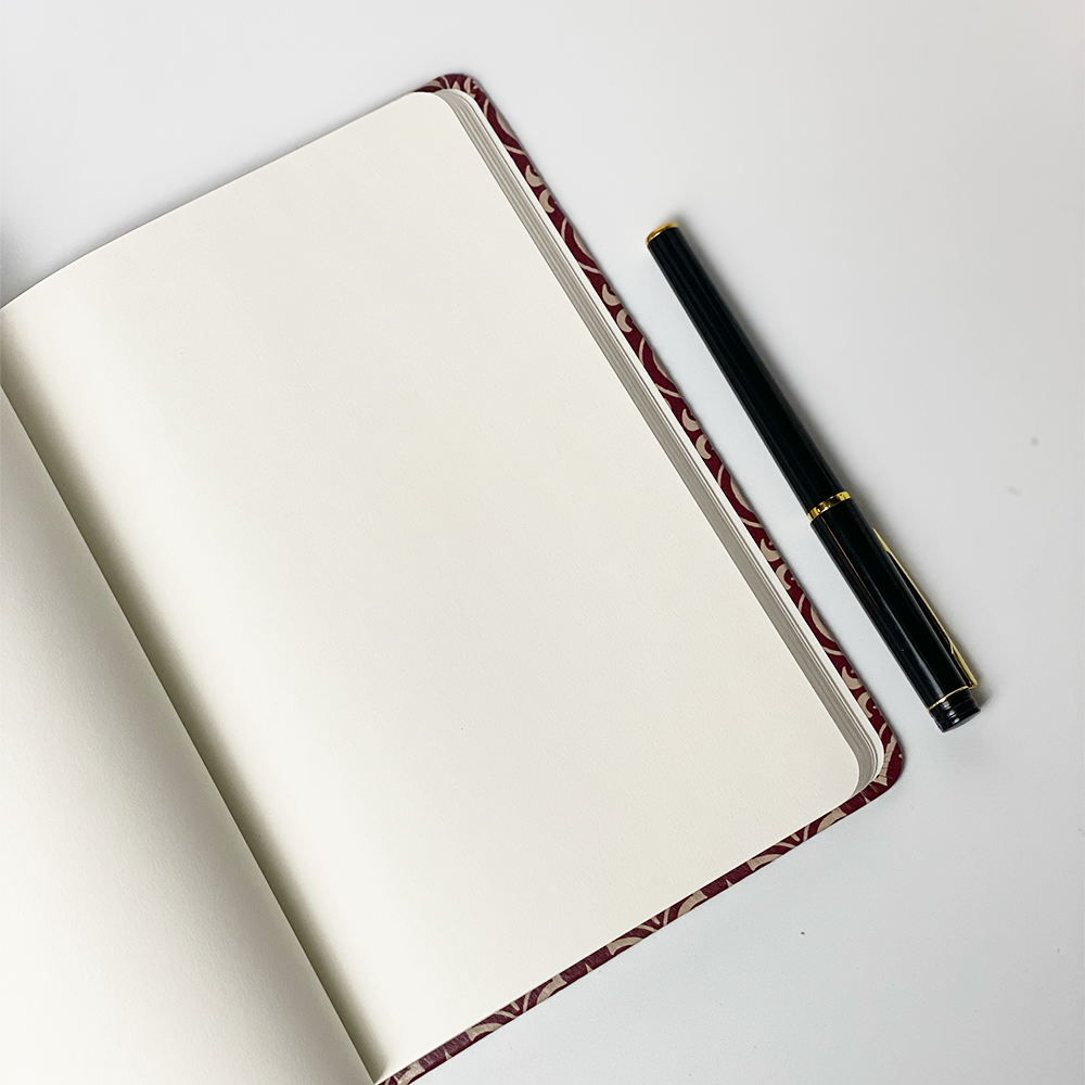 A batik inspired notebook showing inside first page of the notebook. Showing the blank page of the notebook. 