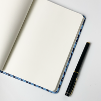 A batik inspired notebook showing inside first page of the notebook. Showing the blank page of the notebook. 