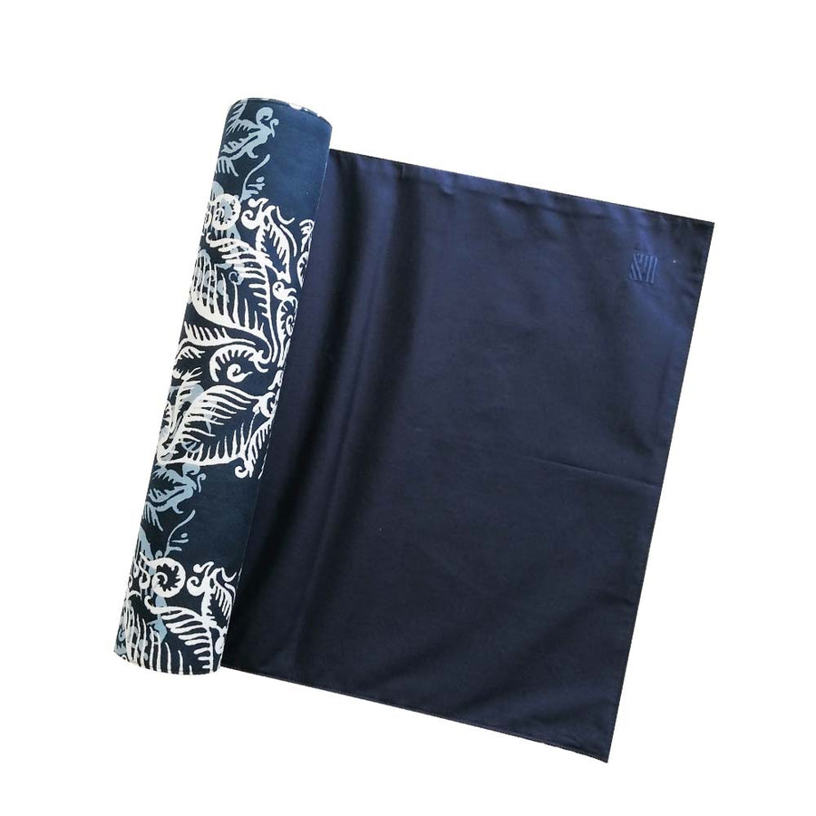 a whitebox photo of batik table runner in blue nautical fern pattern showing front and back of the table runner